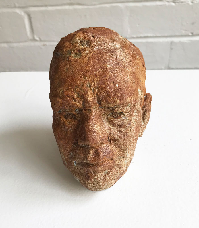 Small ceramic mask sculpture by Michael Knight