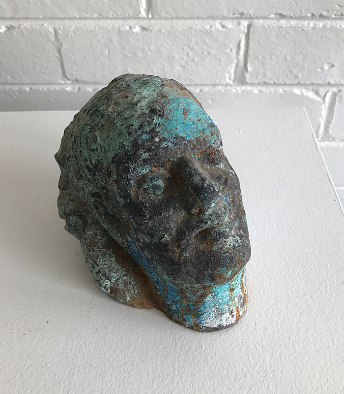 Small ceramic mask sculpture by Michael Knight