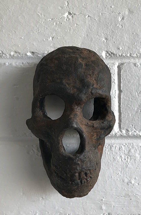 Small ceramic skull sculpture by Michael Knight